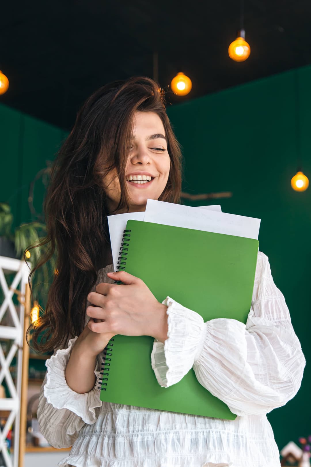 beautiful_business_woman_with_folder_papers_green_interior